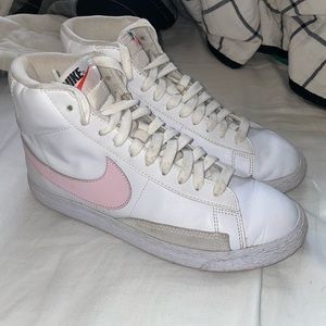 Pink and white Nike Blazers